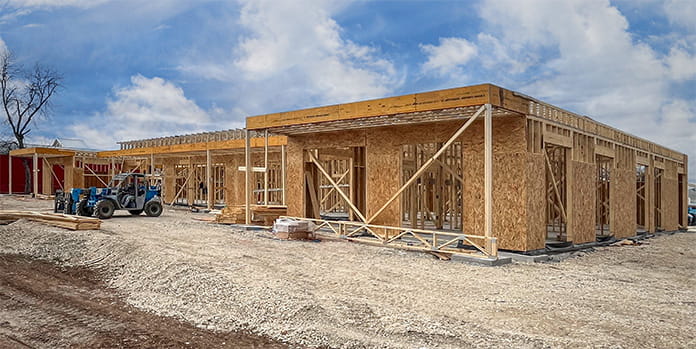 Example of commercial project during framing stage showcasing PHI trusses