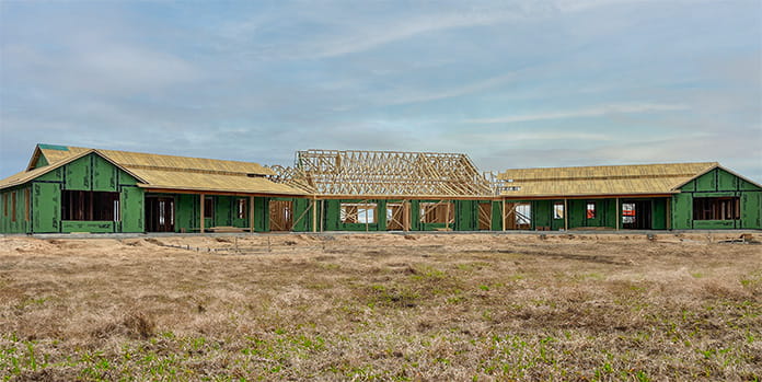 Example of residential project during framing stage showcasing PHI trusses